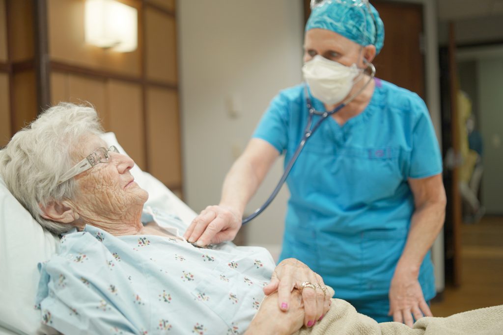 Inpatient Care team with patient