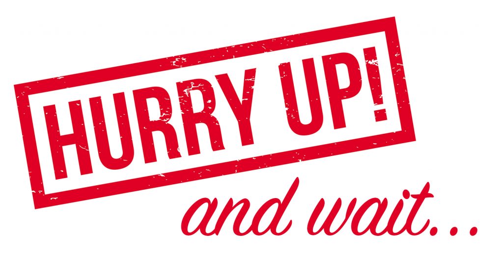 Urgent message with "Hurry Up! and wait" at Guttenberg Hospital entrance.